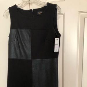 Black sleeveless dress with leather patches